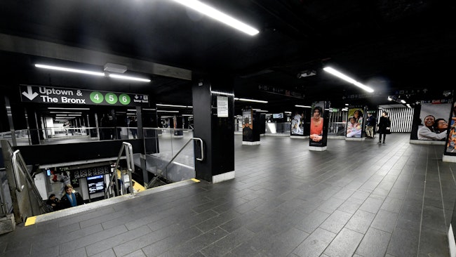 A wide shot of the new station at one of the staircases decending to the uptown 4, 5 and 6 platform.