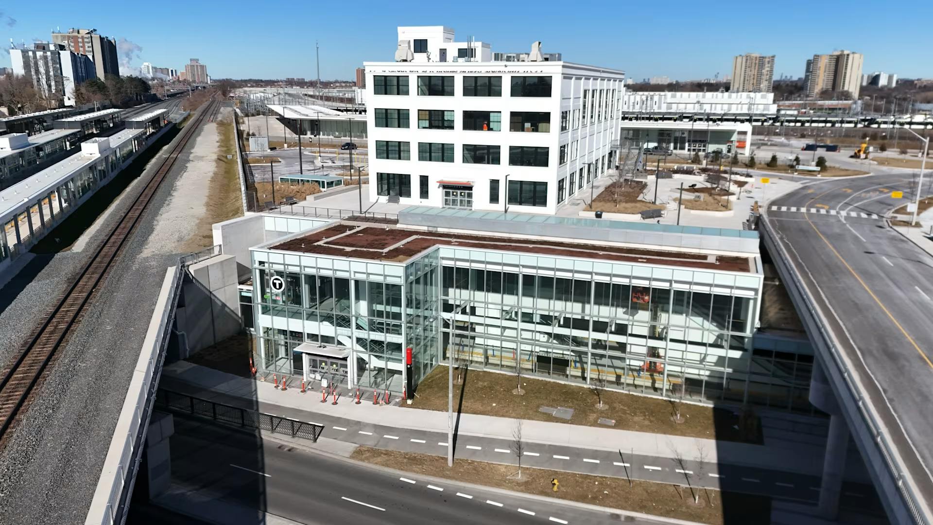 The image shows an exterior wide shot of the new station.