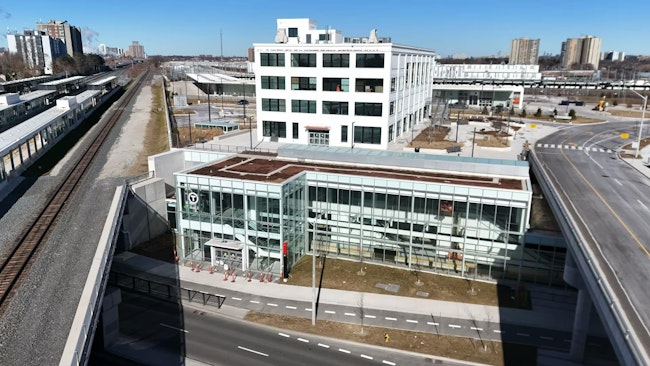 The image shows an exterior wide shot of the new station.