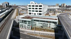 The image shows an exterior wide shot of the new station.