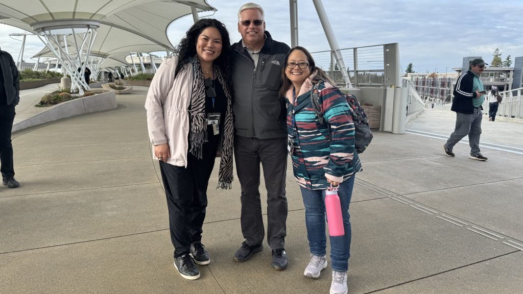 The image shows DHLM&rsquo;s Jennifer Ontai, Kevin Auger and Ailina Laborte at one of the Seattle light rail stations visited during the workshop.