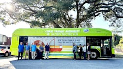 Coast Transit Authority officials stand in front of a CTA bus wrapped with a logo to signify the end of the hailing practice. Coast Transit Authority officials stand in front of a CTA bus wrapped with a logo to signify the end of the hailing practice.