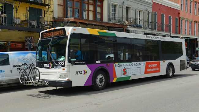 An RTA bus drives down the street.