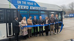 CATA and local leaders hold a ribbon for a ribbon cutting for the new bus. CATA and local leaders hold a ribbon for a ribbon cutting for the new bus.