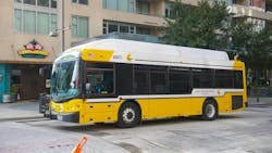 A DART bus drives down a street in Dallas. A DART bus drives down a street in Dallas.