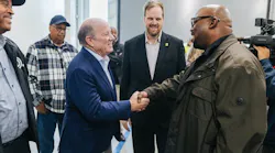 Mayor Mike Duggan greets AFSCME Local 314 President Muneer Isman, who represents DDOT Mechanics, on their new contract that pays them a wage competitive with all other transit agencies in the region.