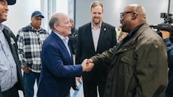 Mayor Mike Duggan greets AFSCME Local 314 President Muneer Isman, who represents DDOT Mechanics, on their new contract that pays them a wage competitive with all other transit agencies in the region. Mayor Mike Duggan greets AFSCME Local 314 President Muneer Isman, who represents DDOT Mechanics, on their new contract that pays them a wage competitive with all other transit agencies in the region.