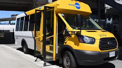A HandyDART bus sits with its door open.