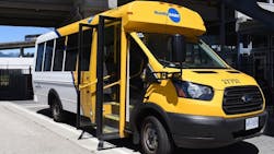 A HandyDART bus sits with its door open. A HandyDART bus sits with its door open.