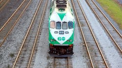 A GO Transit train moves down the track. A GO Transit train moves down the track.