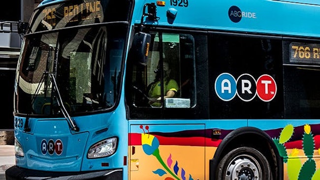 An ABQ Ride bus moves down the street.