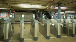 The image shows PATH turnstiles.