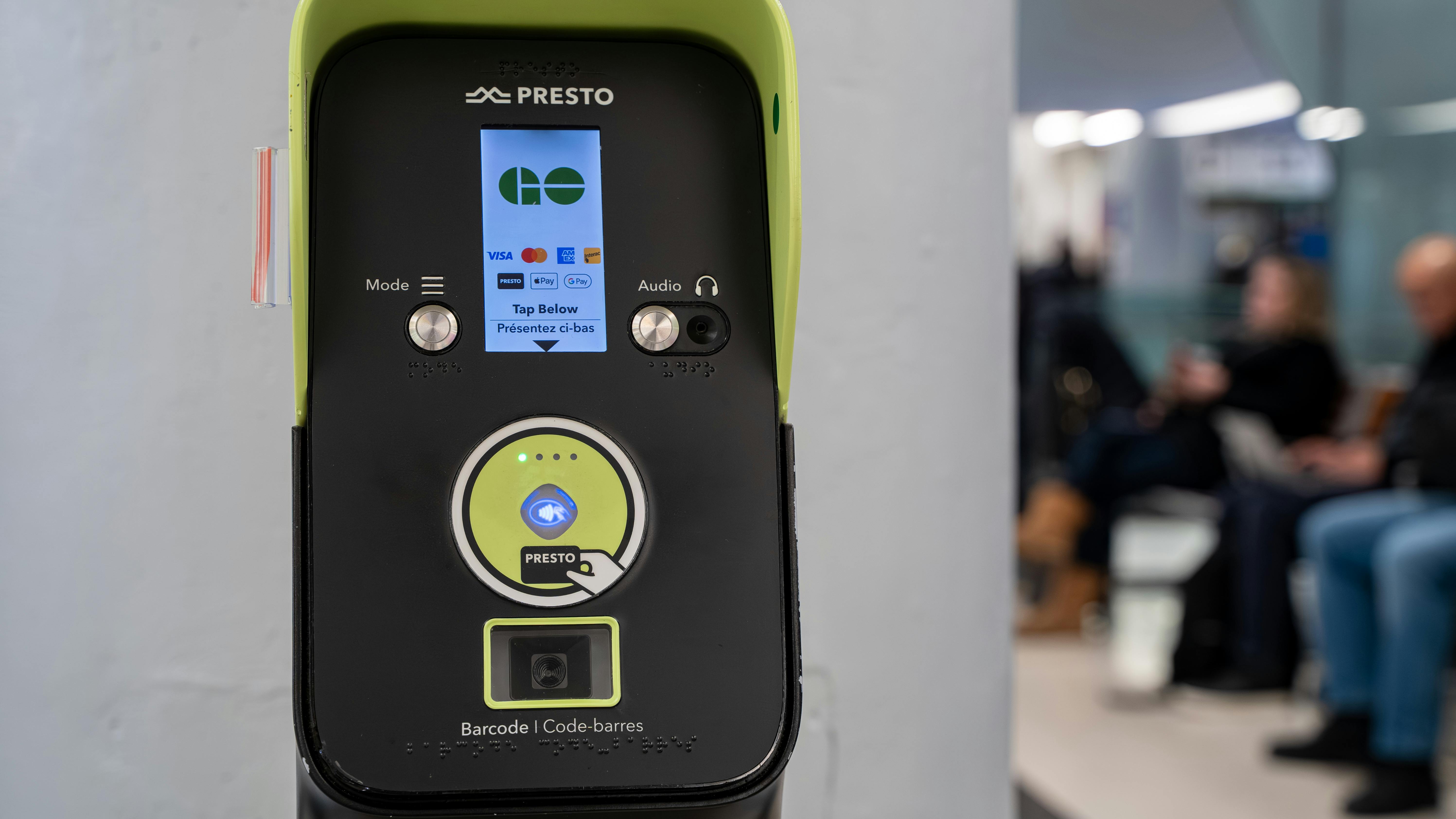 A PRESTO reader sits at a transit station.