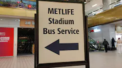 A sign indicates where riders can get bus service at MetLife stadium.