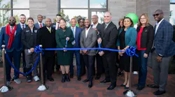 Local leaders gather to cut the ribbon on the new development.