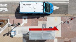 The image displays an overhead view of a NAVI autonomous vehicle. The image displays an overhead view of a NAVI autonomous vehicle.