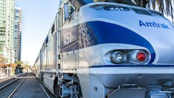 An Amtrak train waits to exit a station. An Amtrak train waits to exit a station.