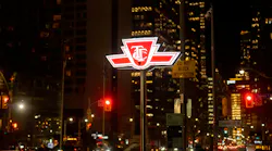 A TTC sign shines at night.