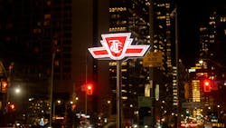 A TTC sign shines at night. A TTC sign shines at night.
