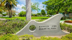 The image shows the sign of the Maurice Gibb Memorial Park, the terminal on the Miami Beach side of the water. The image shows the sign of the Maurice Gibb Memorial Park, the terminal on the Miami Beach side of the water.