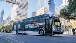 A CapMetro bus drives down the street. A CapMetro bus drives down the street.