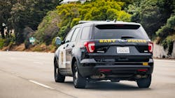 A BART PD cruiser drives away from the camera. A BART PD cruiser drives away from the camera.