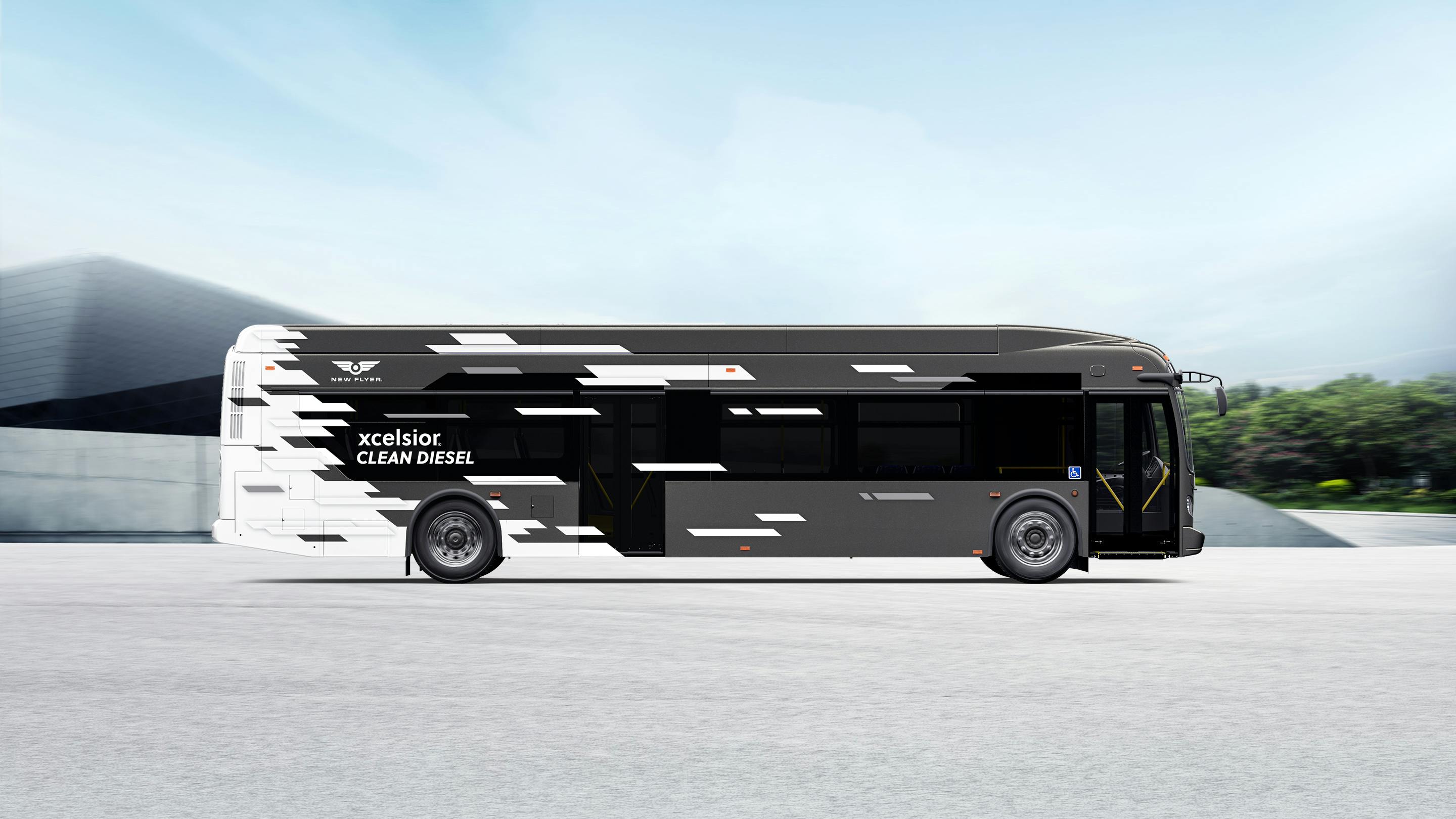 The image shows a side profile of the new New Flyer Xcelsior 40-foot clean-diesel bus.