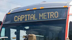 A CapMetro bus display 'Capital Metro' on its exterior display.