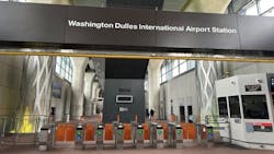 The image displays turnstiles at the Washington Dulles International Airport Station. The image displays turnstiles at the Washington Dulles International Airport Station.