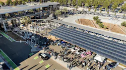 Solar panels on the roof and in parking lot of Warm Springs / South Fremont Station.