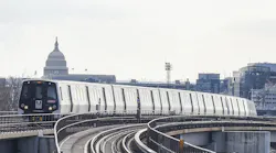 A 7000-series rail set moves down the track.