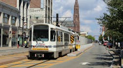 An NFTA-Metro LRT vehicle moves down the track. An NFTA-Metro LRT vehicle moves down the track.