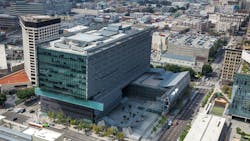 The image shows the Caltrans building from an arial view. The image shows the Caltrans building from an arial view.