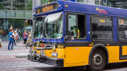 A King County Metro bus moves down a street.