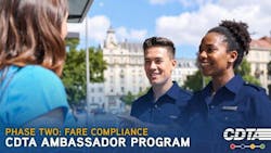 Two ambassadors chat with a passenger. Two ambassadors chat with a passenger.