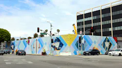 The image shows temporary walls construction areas for the D Line extension project in Beverly Hills.