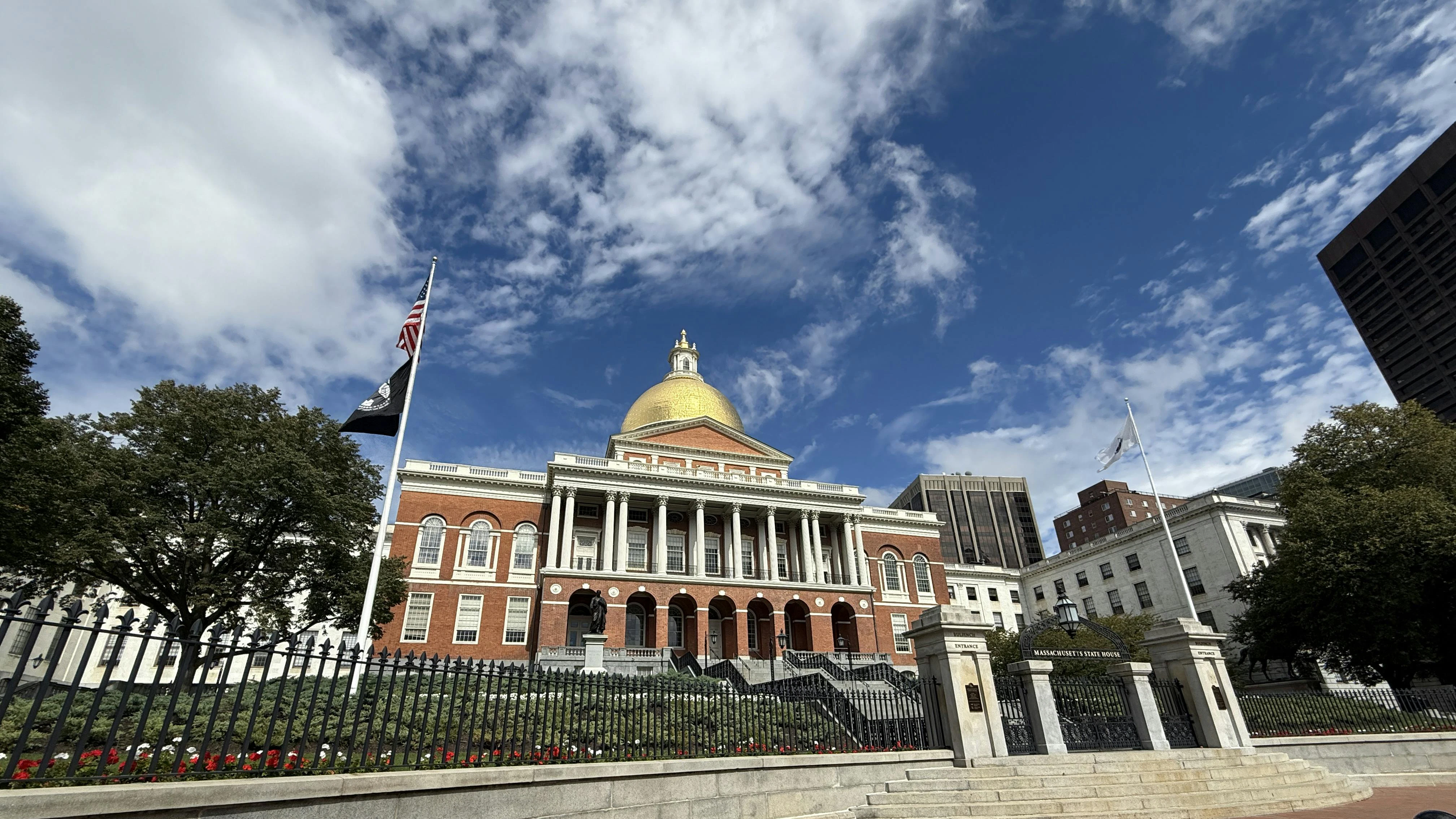 The image shows a wide angle shot of the Massachusetts State House