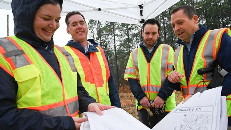 From left to right: North Carolina Department of Transportation (NCDOT) Division 5 Engineer Becca Gallas, NCDOT Secretary Daniel Johnson, Federal Railroad Administration Deputy Administrator Drew Feeley and NCDOT Rail Division Director Jason Orthner reviewed plans for the S‑Line grade separation project on New Hope Church Road in Raleigh, N.C., on Feb. 26.&NegativeMediumSpace;&NegativeMediumSpace;&NegativeMediumSpace;
