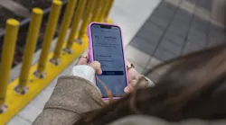 A woman uses the online CATS report tool.