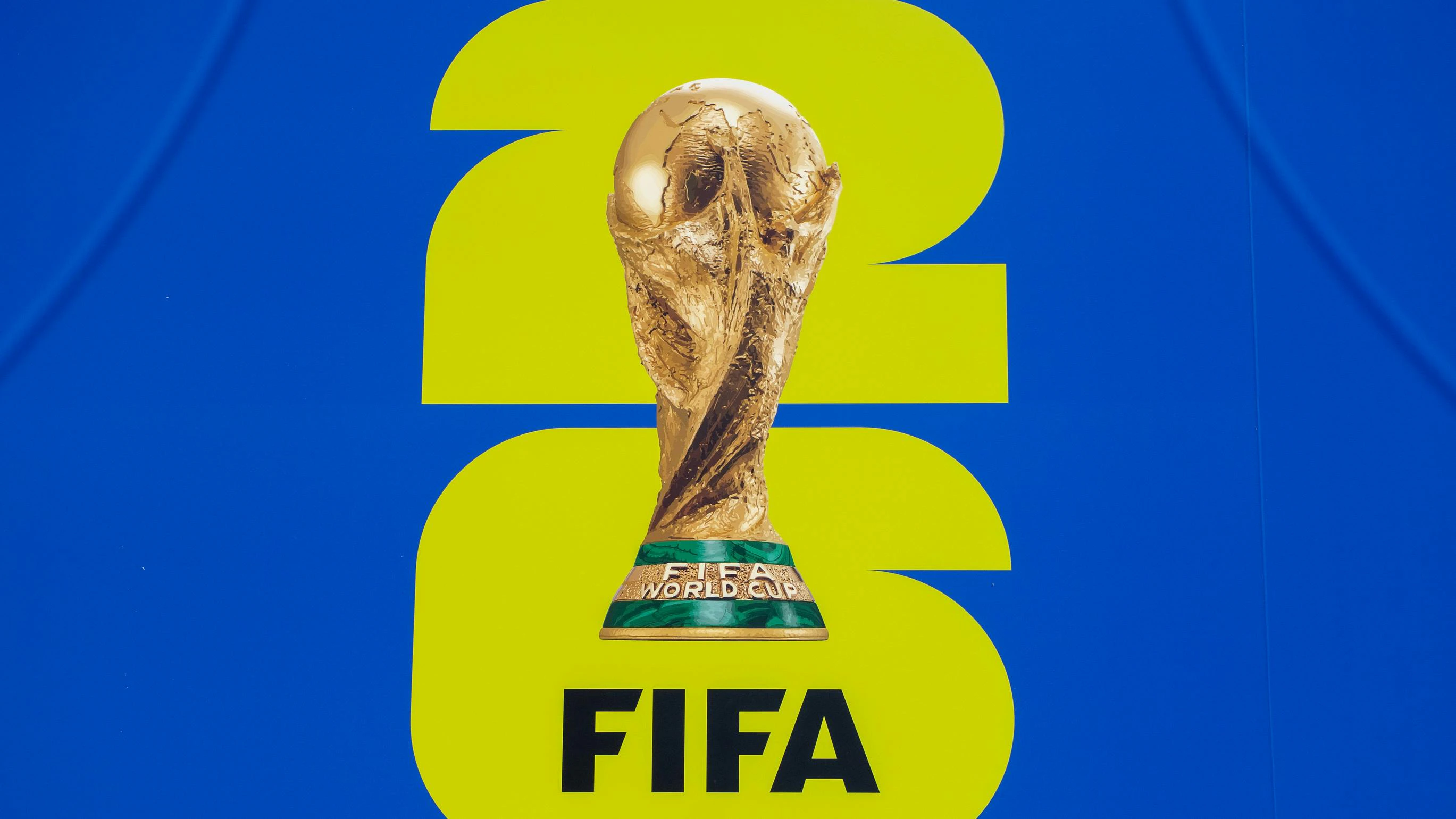 The official FIFA World Cup 2026 logo featuring trophy and '26' design.