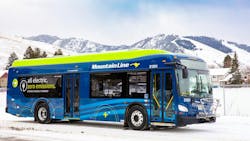 The image shows a Mountain Line bus parked in a snowy area. The image shows a Mountain Line bus parked in a snowy area.