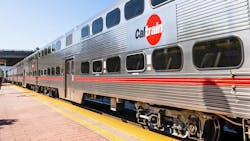 A Caltrain train car sits at a station. A Caltrain train car sits at a station.