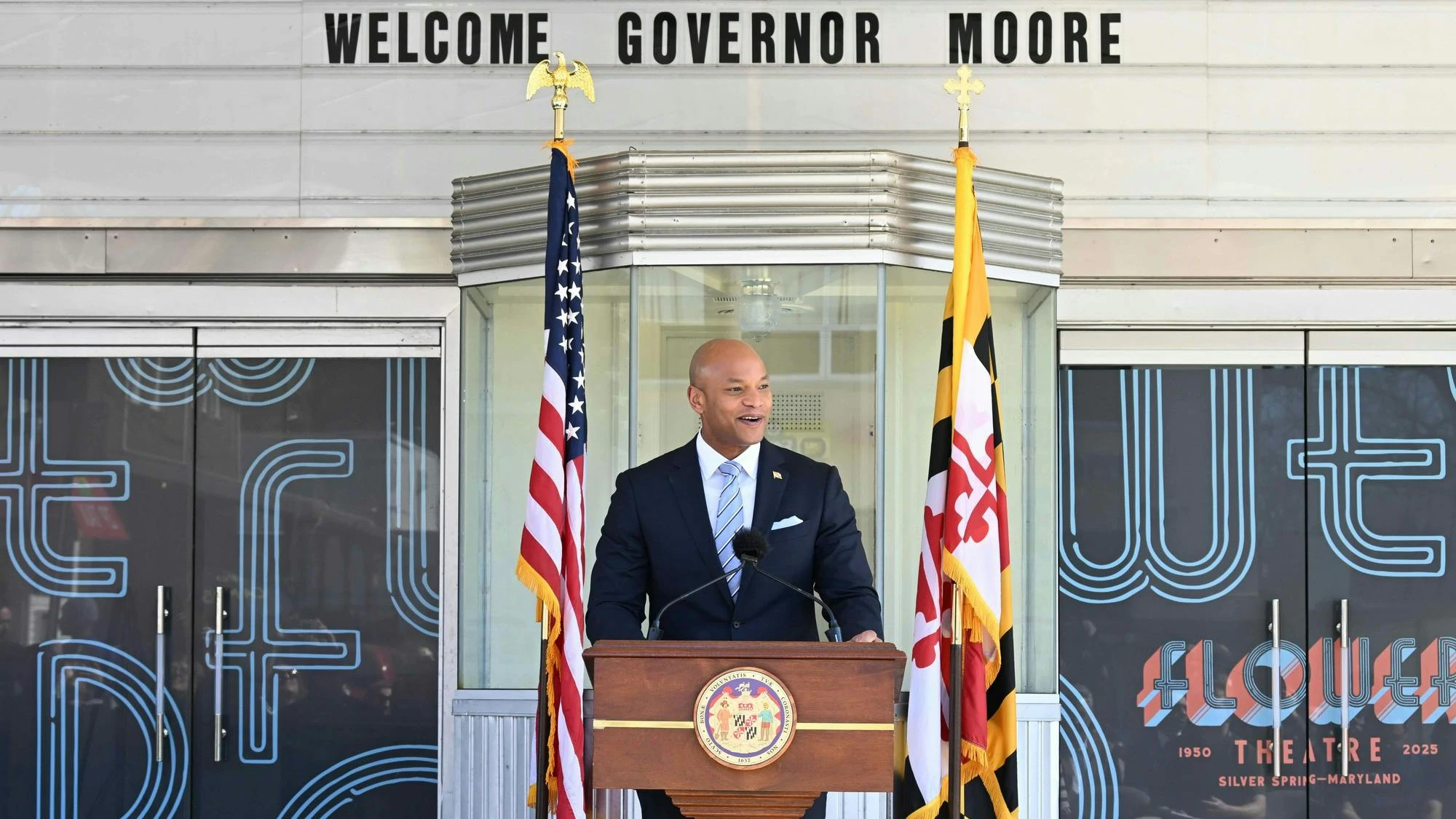 Maryland governor Wes Moore stands at a podium speaking.