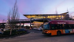 A RapidRide bus drives through dusk. A RapidRide bus drives through dusk.