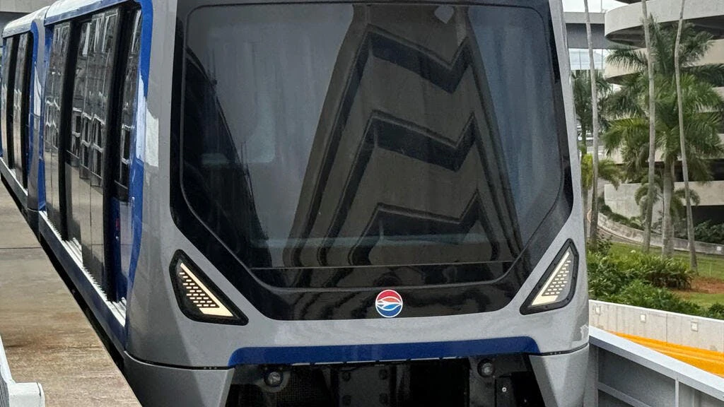 The image shows the front of one of the new Alstom APMs being delivered to TPA.