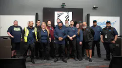 Lane Transit District's new apprenticeship class stands posed with their mentors. Lane Transit District's new apprenticeship class stands posed with their mentors.