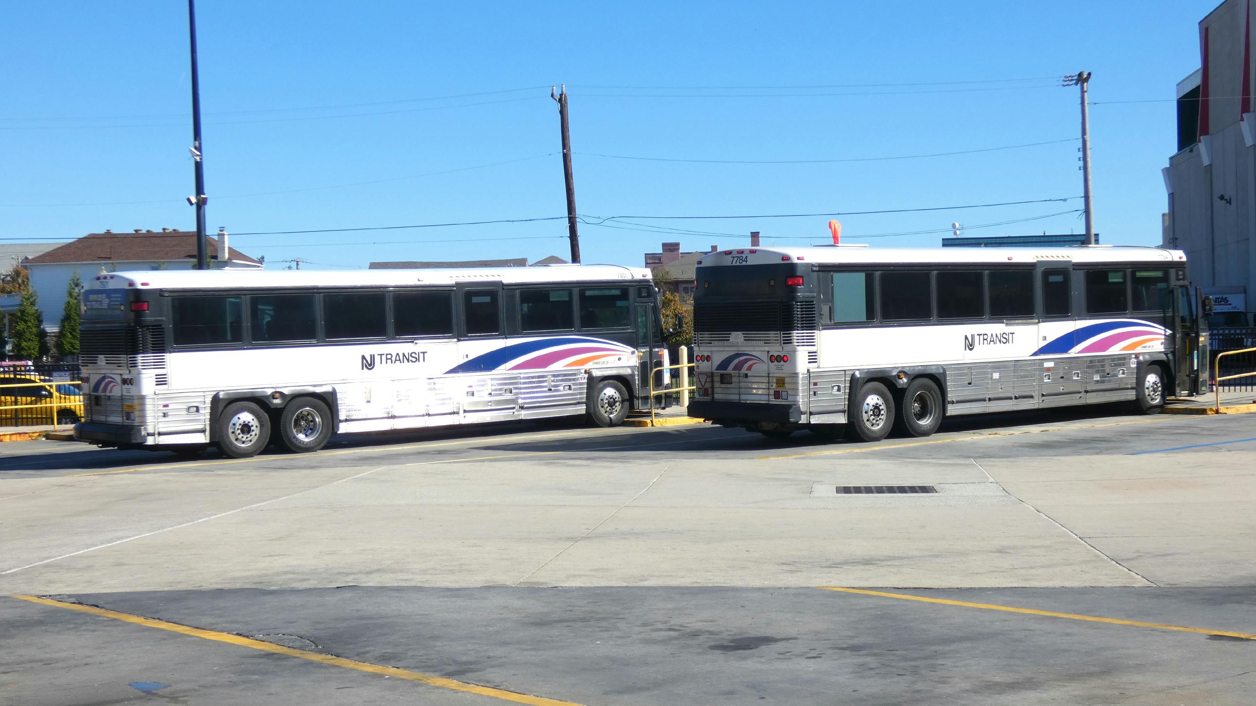 Two New Jersey Transit buses parked at the Atlantic City Bus Terminal.