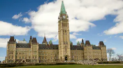The image displays the Canadian Parliament Building in Ottwa.