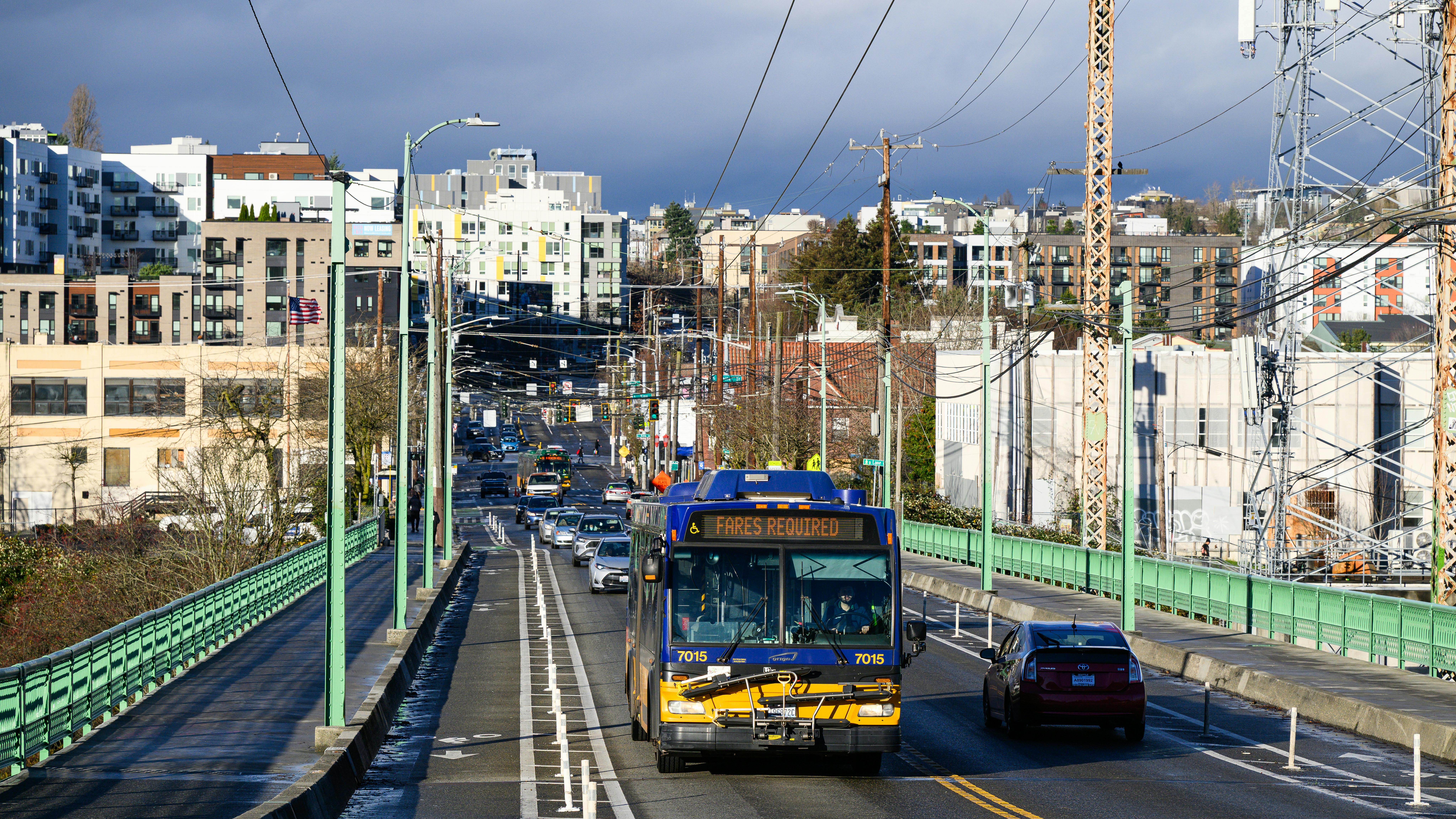 Dr Jose P Rizal Bridge in Seattle with King County Metro hybrid electric transit bus