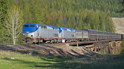This image of the passenger train crossing the trestle was taken in NW Montana near Essex.